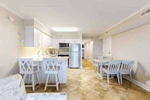 Fridge, microwave, oven, stovetop - Inviting oceanfront condo with hot tub, balcony, central AC, & W/D (Ocean City)