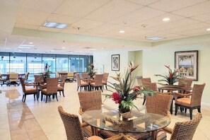 Dining - 4th-floor studio with partial bay views, heated pool, gym, sauna, balcony, & AC (Ocean City)