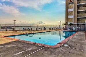 Pool - Canal view condo with pool & grill access - scenic balcony, open layout, and AC (Ocean City)