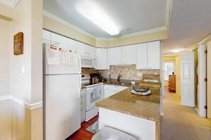 Fridge, microwave, oven, stovetop - Sunny condo w/balconies, full kitchen, A/C & Wifi & just steps to the beach (Ocean City)