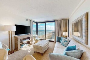TV, offices - Serene oceanfront condo with beach views, pools, gym, tennis & sauna (Ocean City)