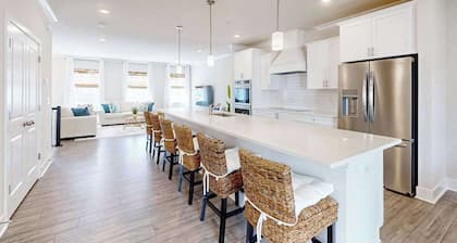Luxury townhome with pool, open layout, deck community pool - close to shopping