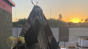 A tent-like structure with a dreamcatcher and a small table with flowers. - Magic ArtHouse at the heart of Las Vegas 
Near everything (North Las Vegas)