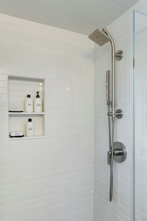 Shower, hair dryer, towels, soap - Stylish West End Condo – Walk to Town, Private Patio, Parking & A/C (Provincetown)