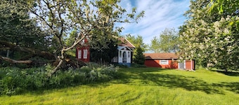 Idyllic vacation home on a sunny plot near the lake