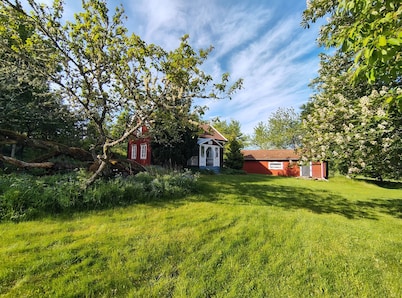 Idyllic vacation home on a sunny plot near the lake
