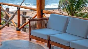 Family Bungalow, Balcony, Beach View | Property grounds
