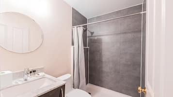 Shower, hair dryer, towels, soap