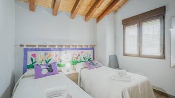 4 slaapkamers, een strijkplank/strijkijzer, beddengoed
