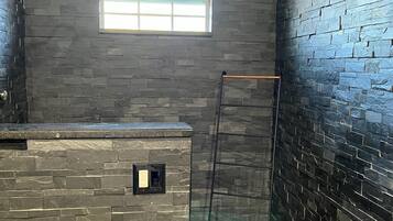 Shower, towels, soap, toilet paper