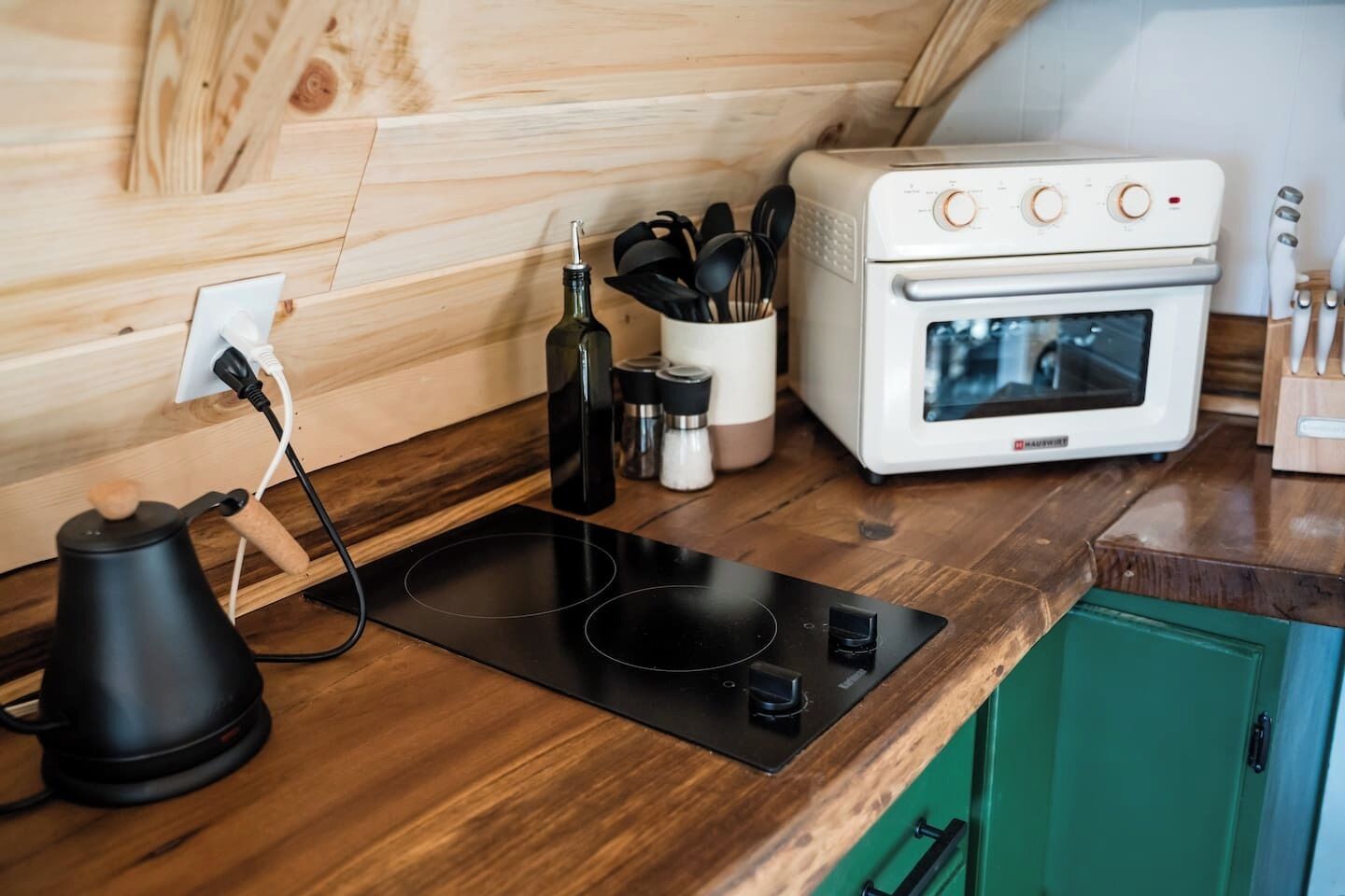 Fridge, stovetop, dishwasher, coffee/tea maker