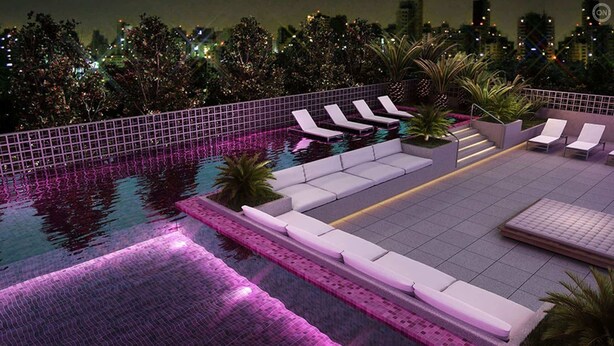 A rooftop pool area with lounge chairs and a water feature. - #CA405 | Cyclinn Casa do Ator Vila Olímpia (Vila Olímpia)