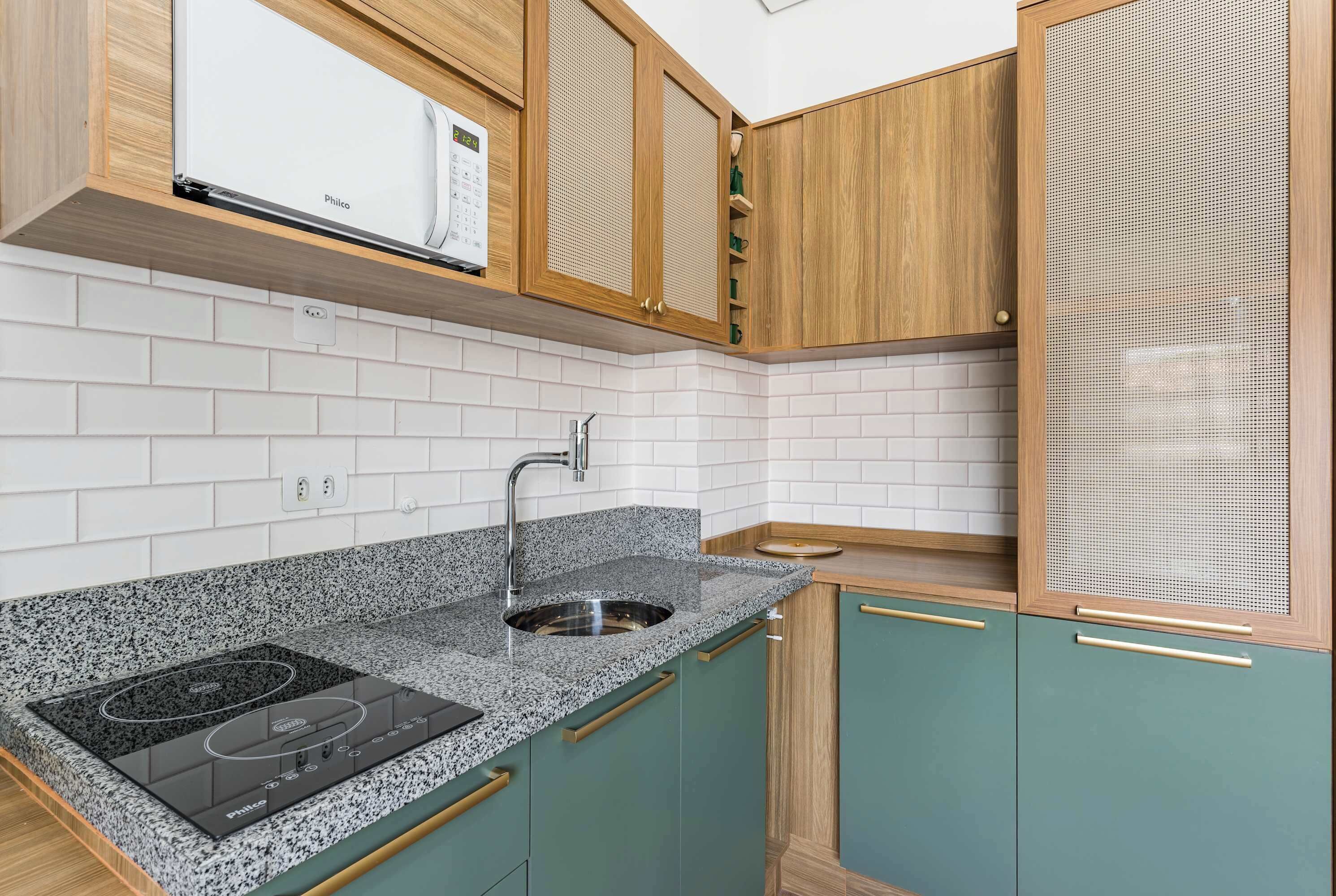 Fridge, microwave, coffee/tea maker, cookware/dishes/utensils