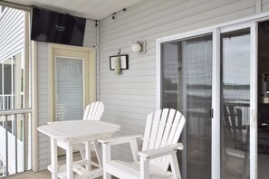Outdoor dining - Total Consciousness 
30 Ft from Water Open Main Channel Views  3BR/3BA (Village of Four Seasons)