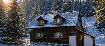 Cozy alpine hut in the mountains near ski areas