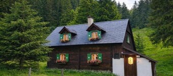 Cozy alpine hut in the mountains near ski areas