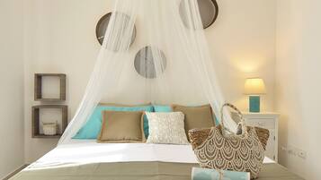 Tabla de planchar con plancha, wifi gratis, ropa de cama