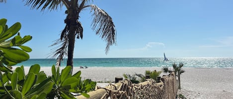 On the beach, sun-loungers, beach towels