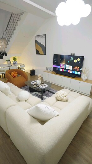 Living area - Crowned Comfort | 2BR Terrace Duplex + Pool
& Gym (Lekki)