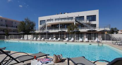 T3 duplex près du port avec balcon & accès piscine