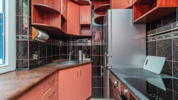 Departamento Confort, balcón | Cocina privada