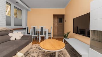 Departamento Confort, balcón | Área de sala de estar