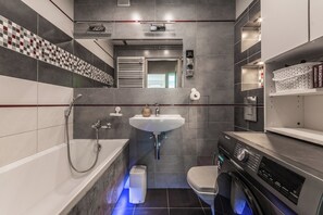 Departamento Confort, balcón | Baño