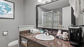 Separate bathtub and shower, hair dryer, towels, soap