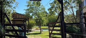Relaxing  1-bedroom suite on farmhouse property next to water fountain