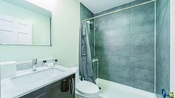 Shower, hair dryer, towels, soap