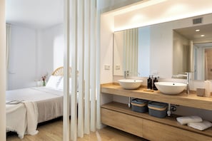 A modern bathroom with two sinks, a large mirror, and a wooden vanity. - Solina | Swimming Pool | Terrace | Palamos (Palamos)