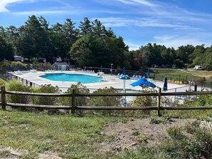 Outdoor pool - Cozy 2-bedroom cabin with AC. Fun for all ages with pond and pool access.  (Falmouth)