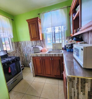 Family Apartment | Private kitchen - Comfy Bogue Apartments (Montego Bay)