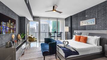 Apartment, 1 King Bed, Air conditioning, City View | Hypo-allergenic bedding, individually decorated, individually furnished