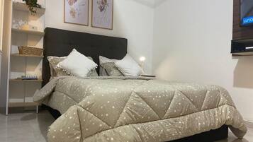 Tabla de planchar con plancha, Internet, ropa de cama
