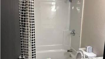 Hair dryer, towels, soap, toilet paper
