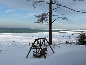 On the beach - Welcome to your peaceful Lake Huron getaway located along US Highway 23 N in Ocqueoc. (Ocqueoc)