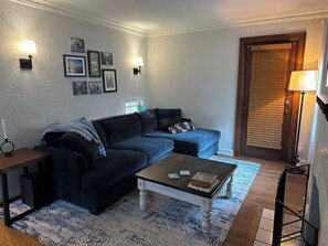TV, fireplace - 3-bedroom house in Waldo Neighborhood of Kansas City with all the vibes. (Kansas City)