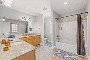 Shower, hair dryer, towels, shampoo