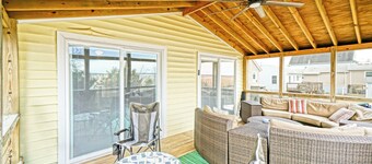 Pets Welcome! Modern Cottage + Screened-In Deck, Steps from the Beach