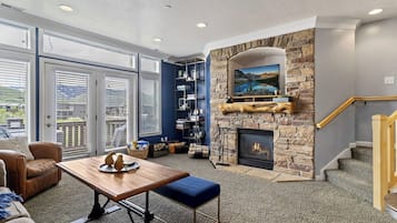 Smart TV, fireplace, DVD player, foosball