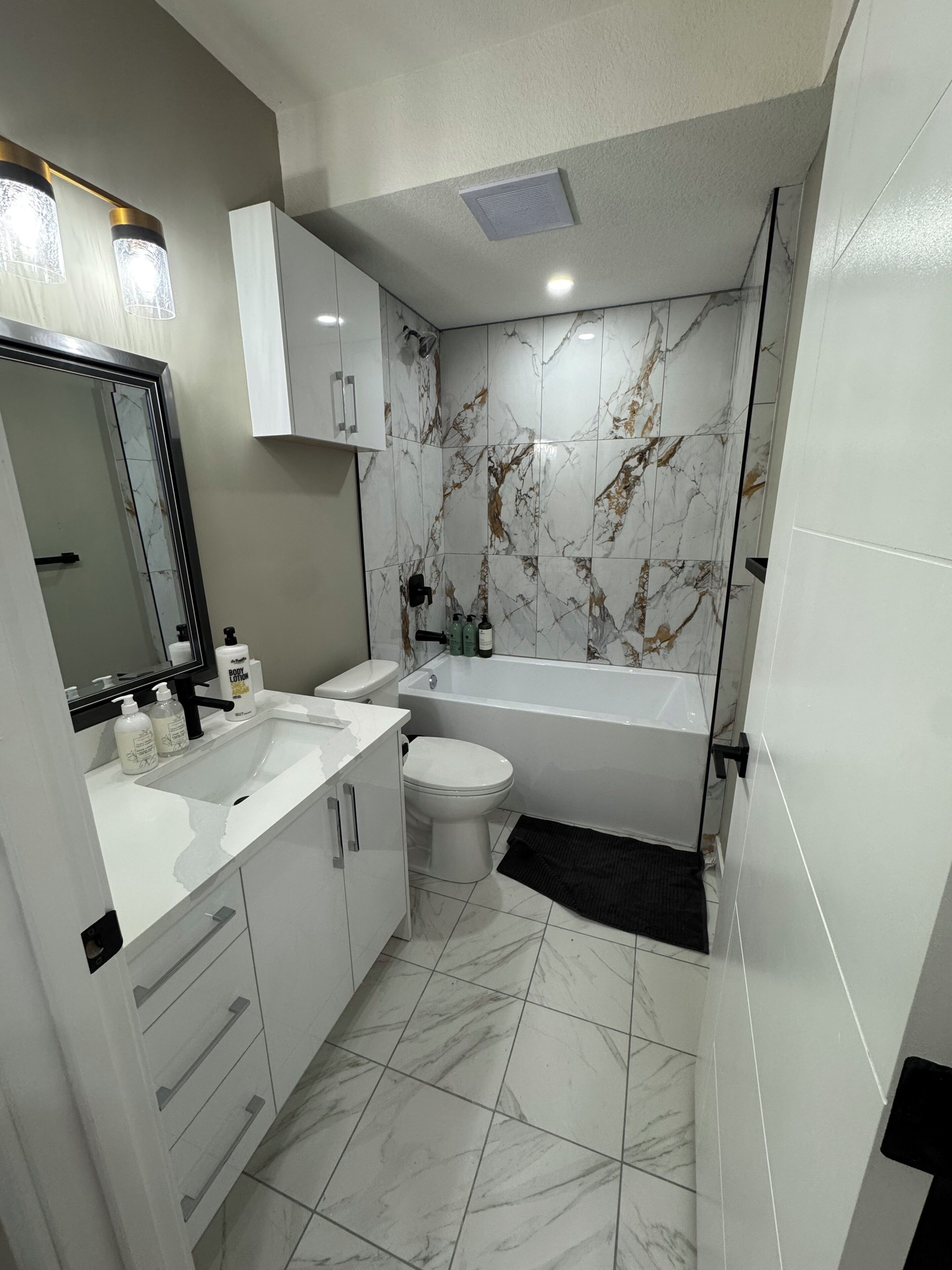 Hair dryer, towels, soap, toilet paper