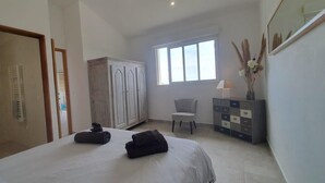 Iron/ironing board, travel crib, WiFi, bed sheets