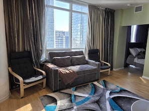 Living area - In the heart of Toronto's Entertainment district with a lake view family abode. (Toronto)