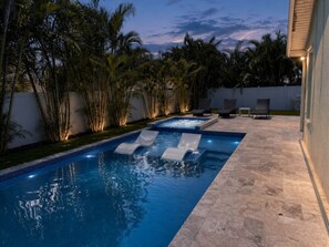 Outdoor pool, a heated pool - Elegant 4-bed Home w/ Pool & Spa Near Anna Maria (West Bradenton)