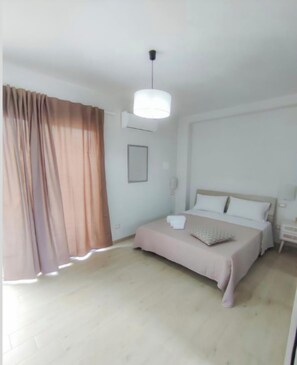 Condo clásico, vista al jardín | Cortinas blackout, tabla de planchar con plancha y wifi gratis