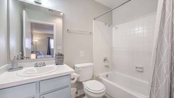 Shower, hair dryer, towels, shampoo