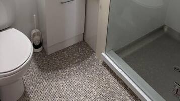 Hair dryer, slippers, towels, soap