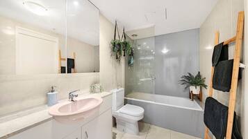 Hair dryer, towels, soap, shampoo