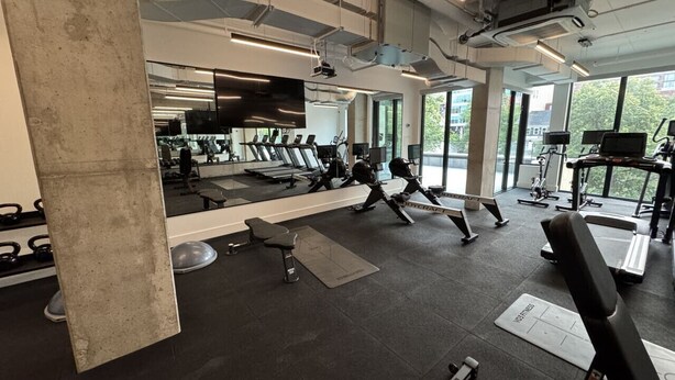 A gym with treadmills, weight machines, and free weights. - 2Bed 2.5Bath Pet Friendly Townhouse Downtown Halifax (Halifax)